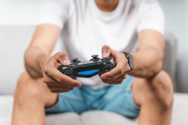 Person playing a calming video game, reflecting why simple tasks help people feel less overwhelmed