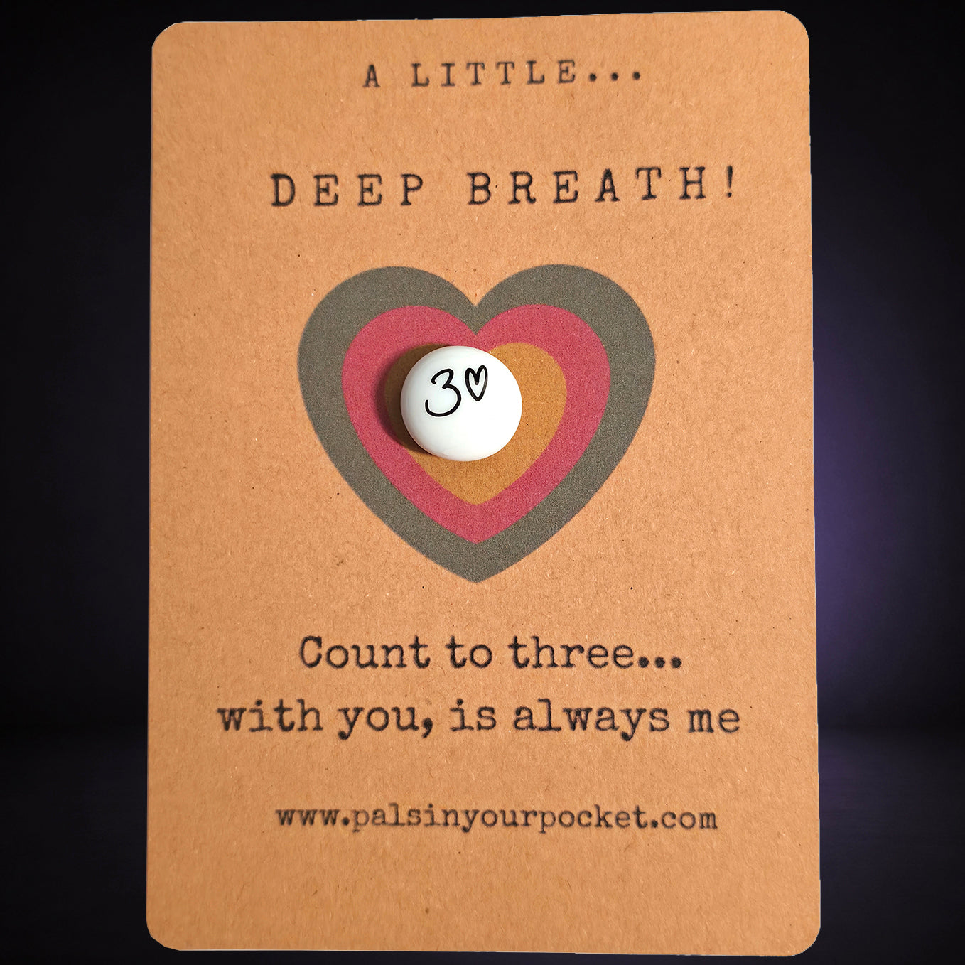 A Little Deep Breath mindfulness pebble on affirmation card encouraging calm breathing and counting to three.