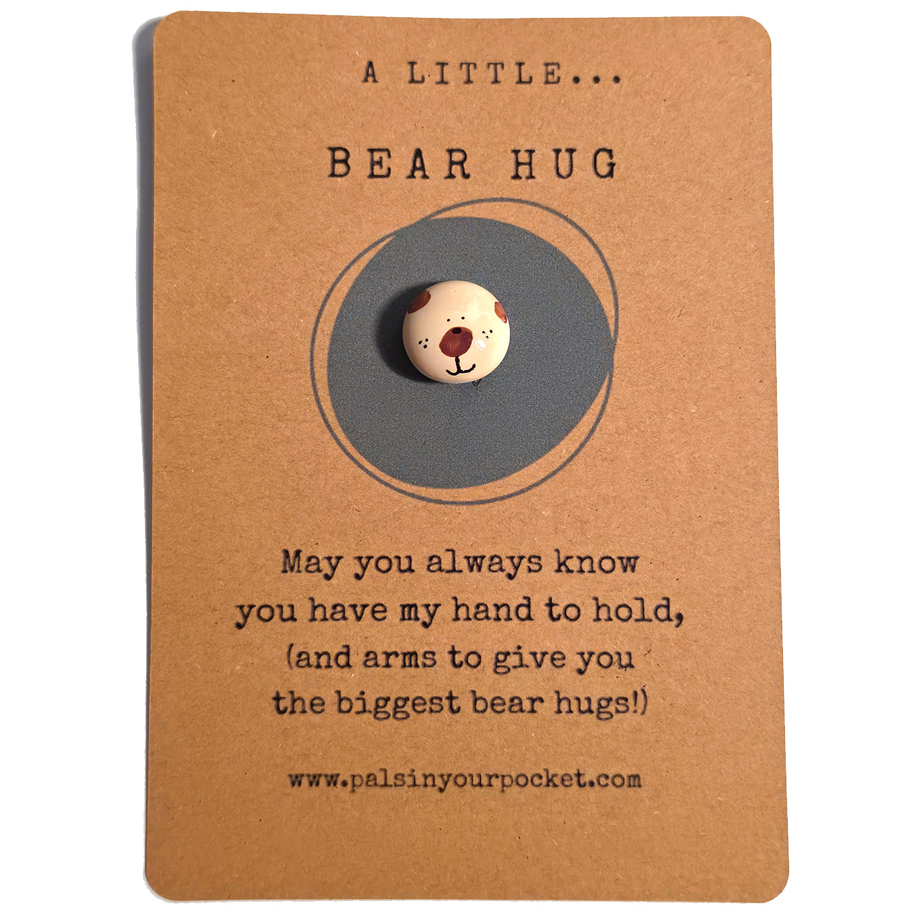 A Little Bear Hug mindfulness pebble with cute bear face on comforting affirmation card.