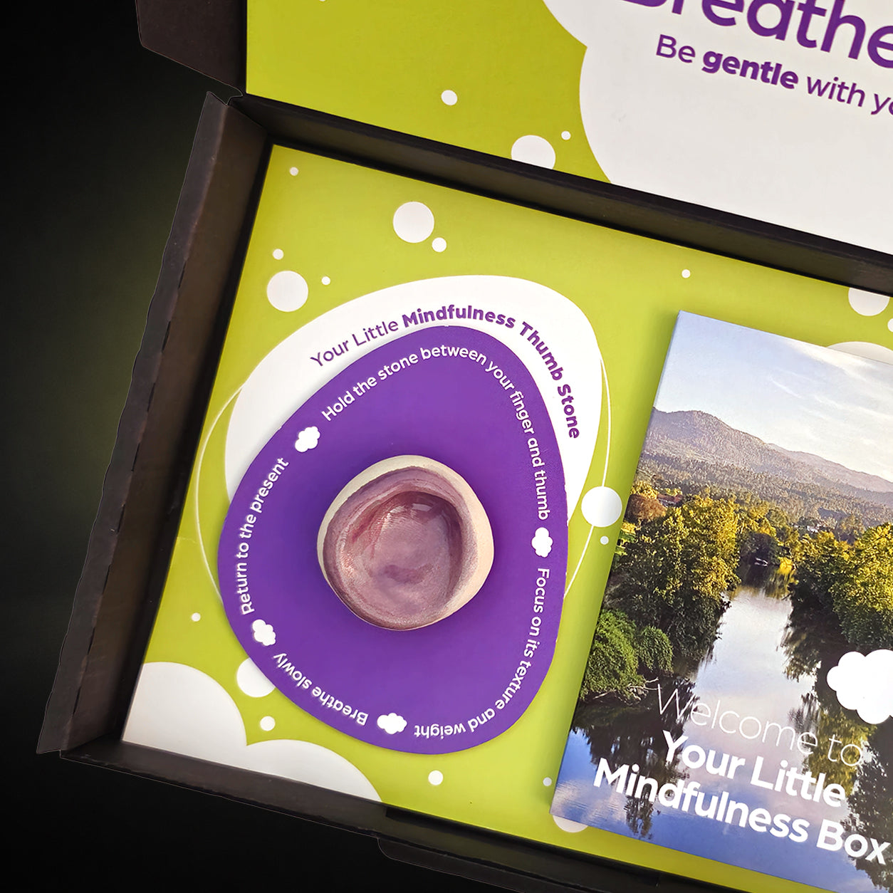 Sympathy gift with grounding worry stone and mindfulness guide to offer comfort and support after bereavement