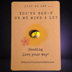 Just to Say You've Been on My Mind a Lot mindfulness pebble with cute bee on thoughtful affirmation card.
