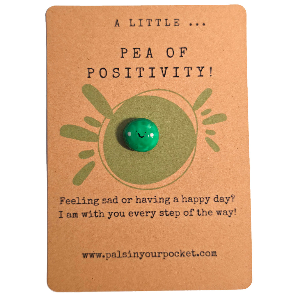 A Little Pea of Positivity mindfulness pebble with smiling green pea on uplifting affirmation card.
