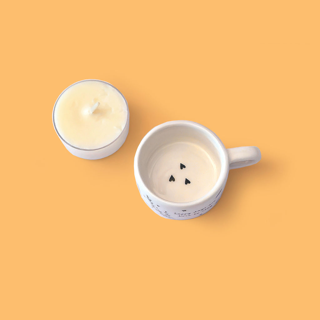 Ceramic tea light holder with unscented tea light candle